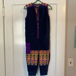 {Patagonia} Patched fleece synchilla jumpsuit